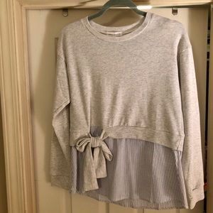 Women’s long sleeve top with mid belly bow
